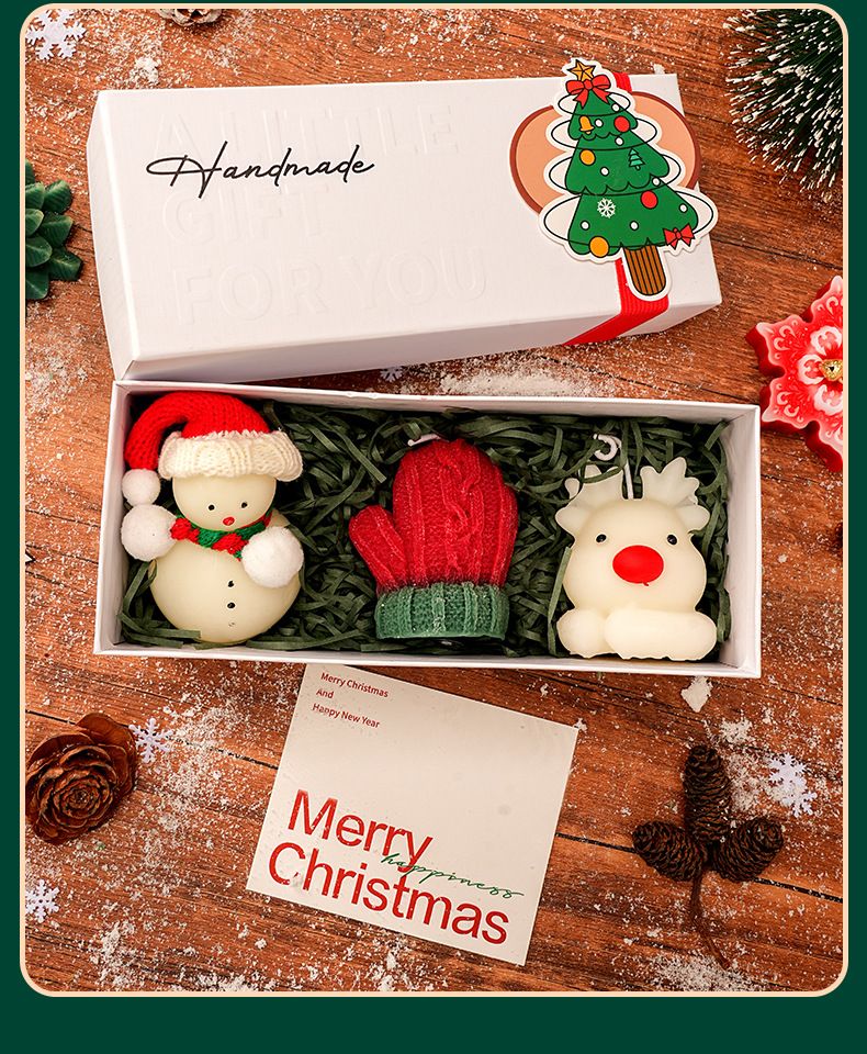 Vela aromática navideña artesanal con forma de árbol de Navidad y ciervo, en caja de regalo._voghion.com