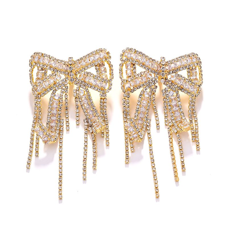 Orecchini con fiocco e nappa, design a clip, orecchini con strass, orecchini squisiti e alla moda_voghion.com