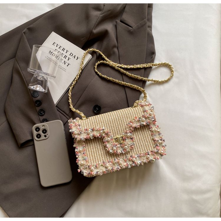 Korean version of Xiaoxiangfeng chain 2024 summer new women's stylish lace shoulder bag, personalized grass woven_voghion.com