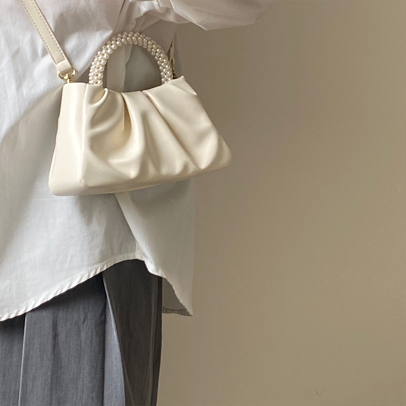 2024 Mini borsa a tracolla singola a spalla singola per telefono cellulare piegata alla moda da donna piccola perla_voghion.com