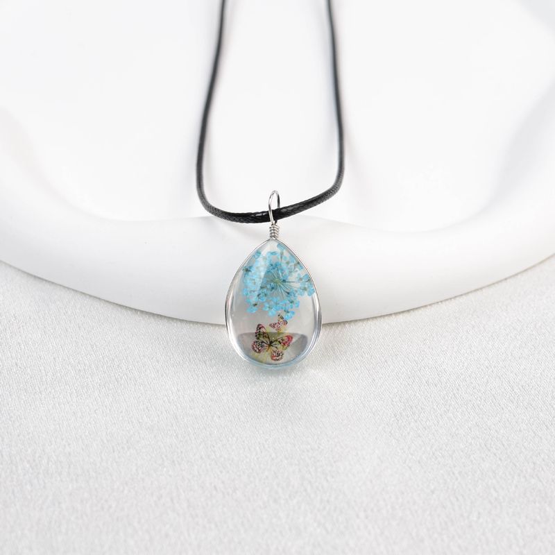Collana con fiore in pizzo e cielo stellato in stile fresco, goccia d'acqua in vetro, tempo Jingdezhen, vendita calda_voghion.com