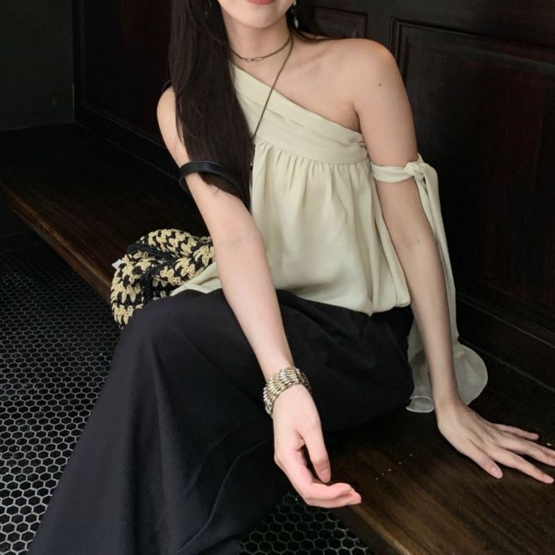 Gilet corto senza maniche con nastro dal design ampio per donna, estate 2025, nuovo top asimmetrico con boccioli di fiori irregolari in stile francese_voghion.com