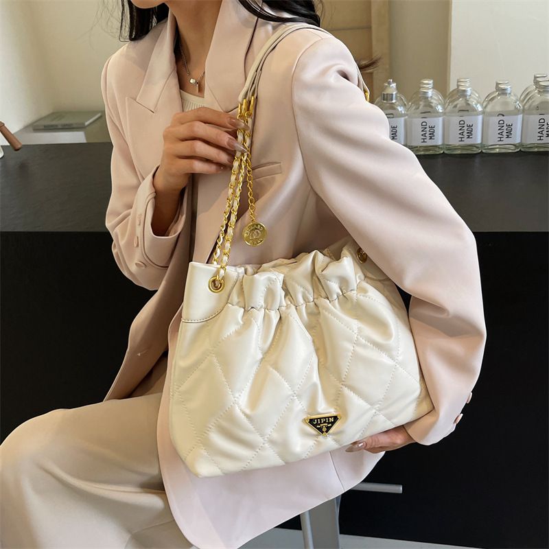 Borsa a secchiello con catena trapuntata, stile 2024, nuova tendenza della moda, borsa a tracolla in tinta unita, grande capacità, da portare sotto le ascelle_voghion.com