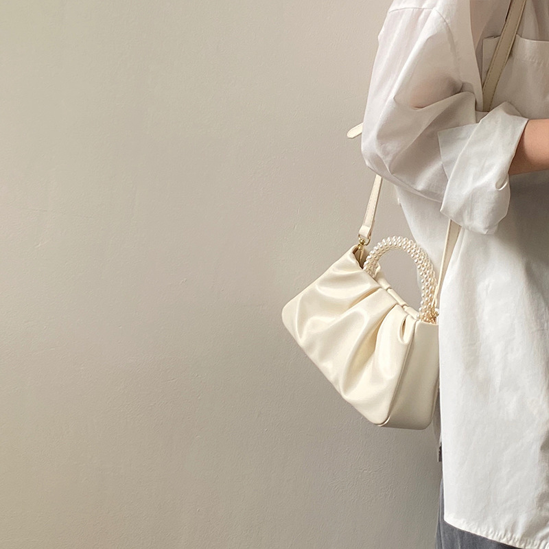 2024 Mini borsa a tracolla singola a spalla singola per telefono cellulare piegata alla moda da donna piccola perla_voghion.com