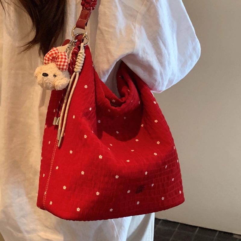 Borsa a secchiello casual da donna con tracolla di grande capacità, con trama a pois rossi e texture rugosa, 2025_voghion.com
