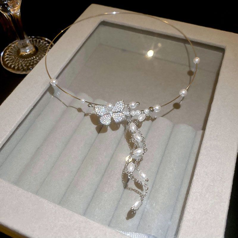 Collar de borlas de perlas y mariposa plateada para mujer, nuevo y popular gargantilla de alta gama de 2024_voghion.com