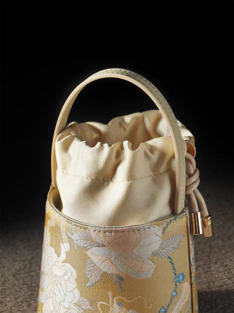 Borsa a secchiello portatile da donna in stile nazionale cinese Kirin Peony, mini 2025_voghion.com