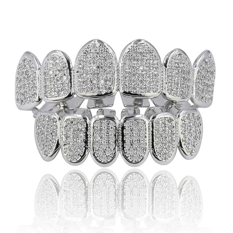Gioielli per uomo e donna, apparecchi ortodontici con microdiamanti, denti da vampiro_voghion.com