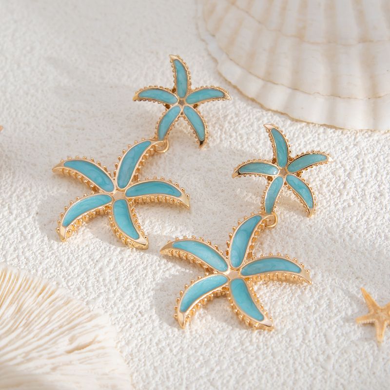 Fashion Drip Oil Five Leaf Flower Female Personality Geometric Metal Starfish Earrings_voghion.com